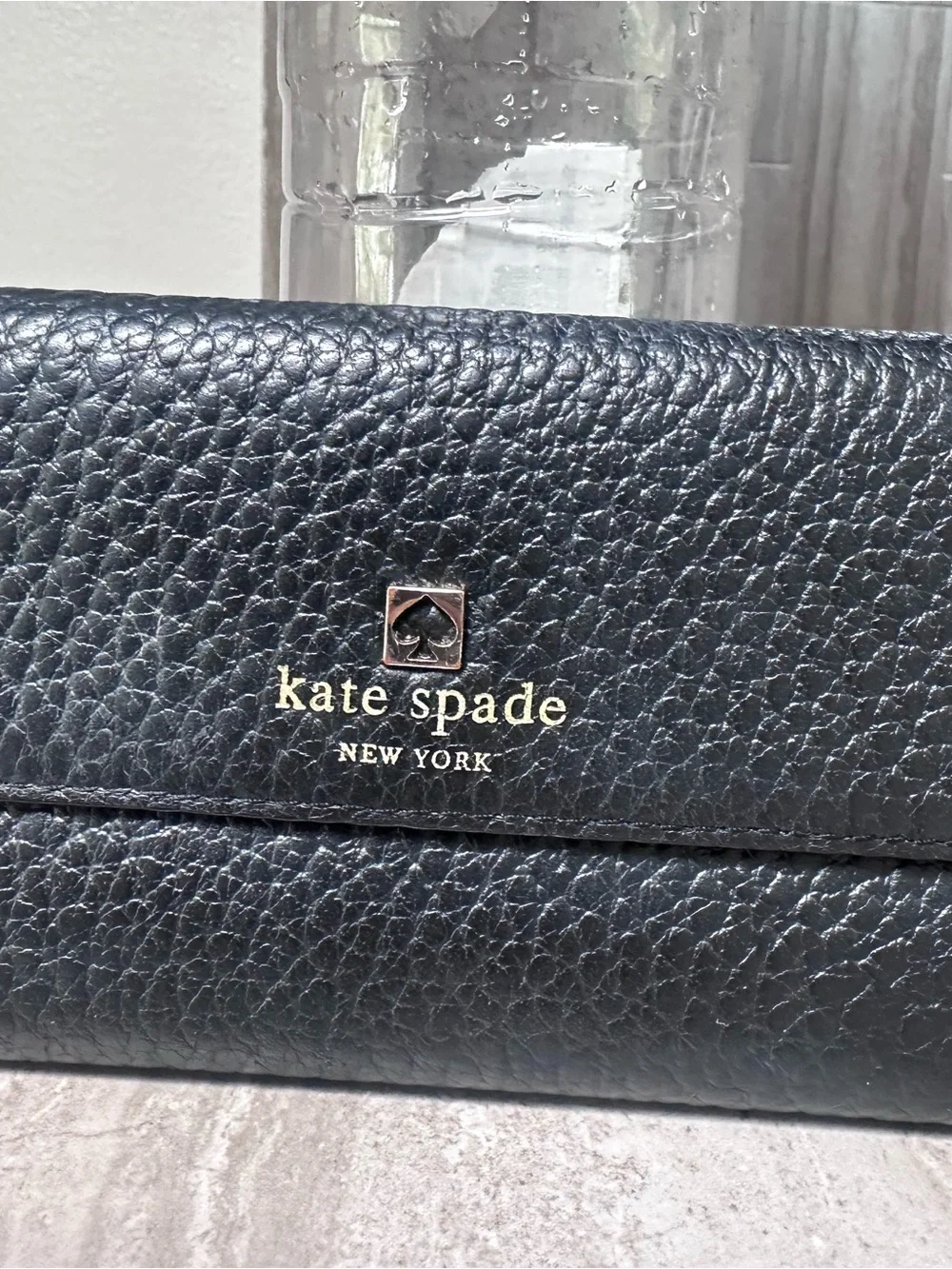 kate spade Black Pebbled Leather Wallet with Gold Logo